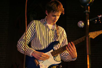 de gitaar in de spotlights 2008